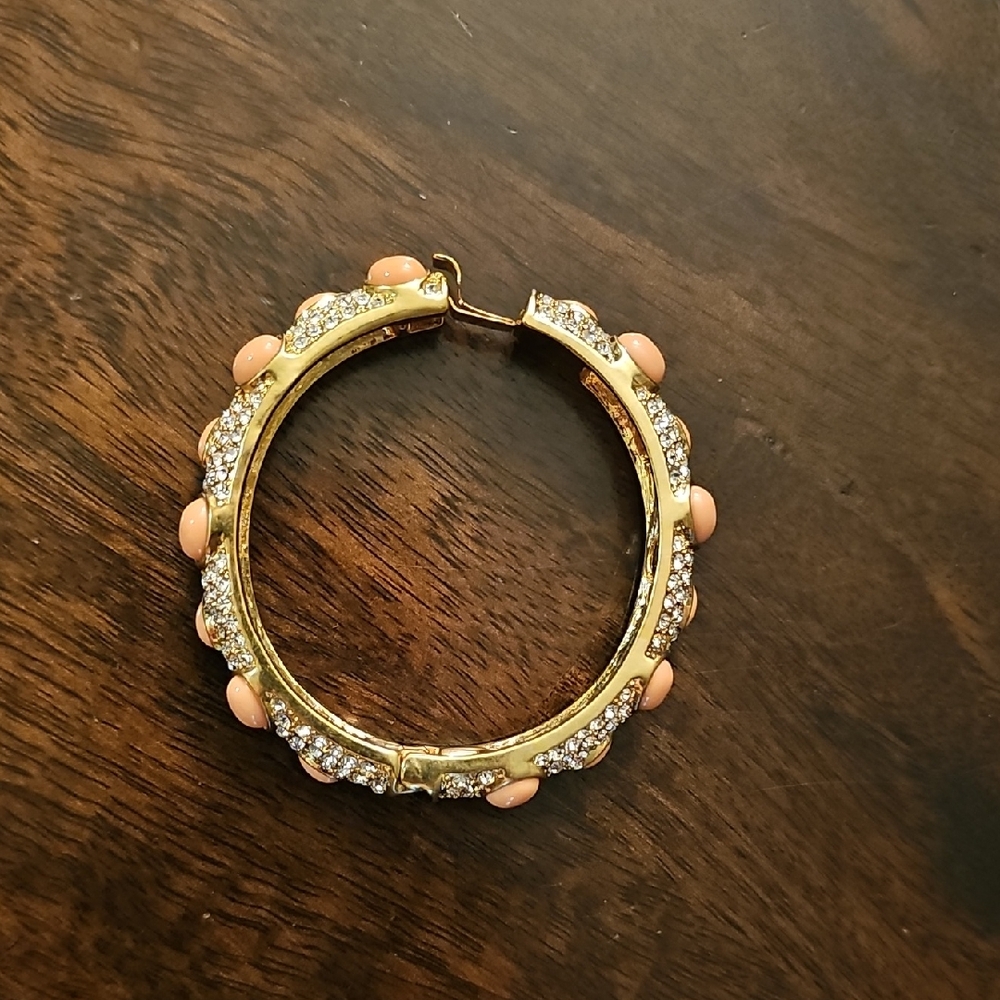 Elegant Gold and Peach Bracelet.